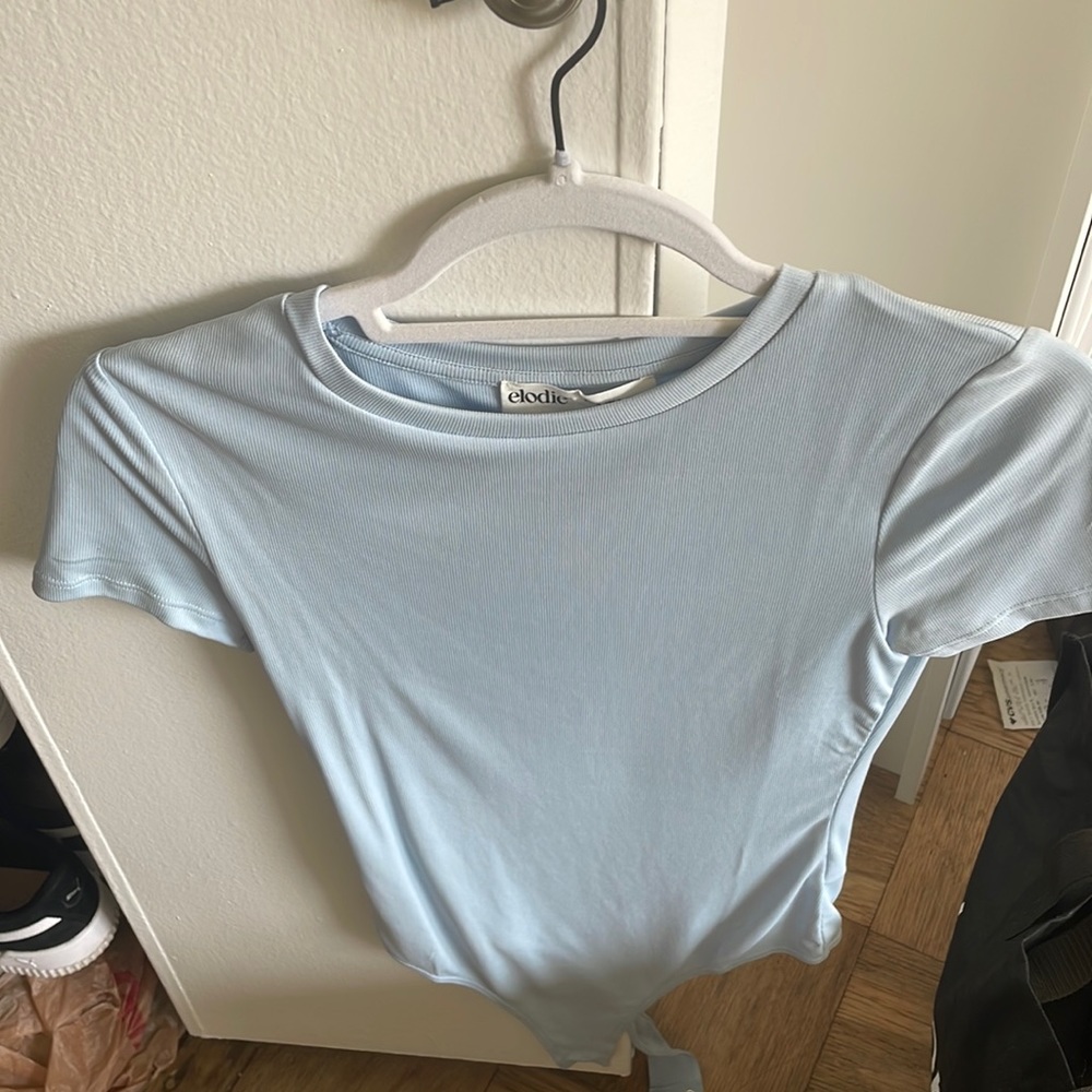 Light blue body suit